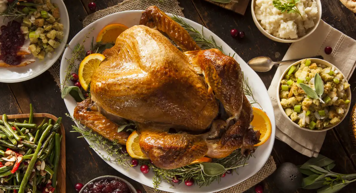 Homemade turkey on set thanksgiving table 