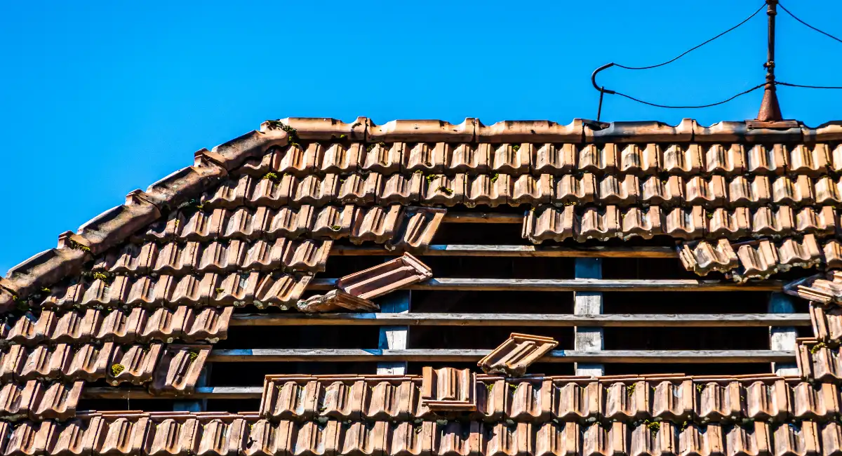 Broken rooftop with detached slates
