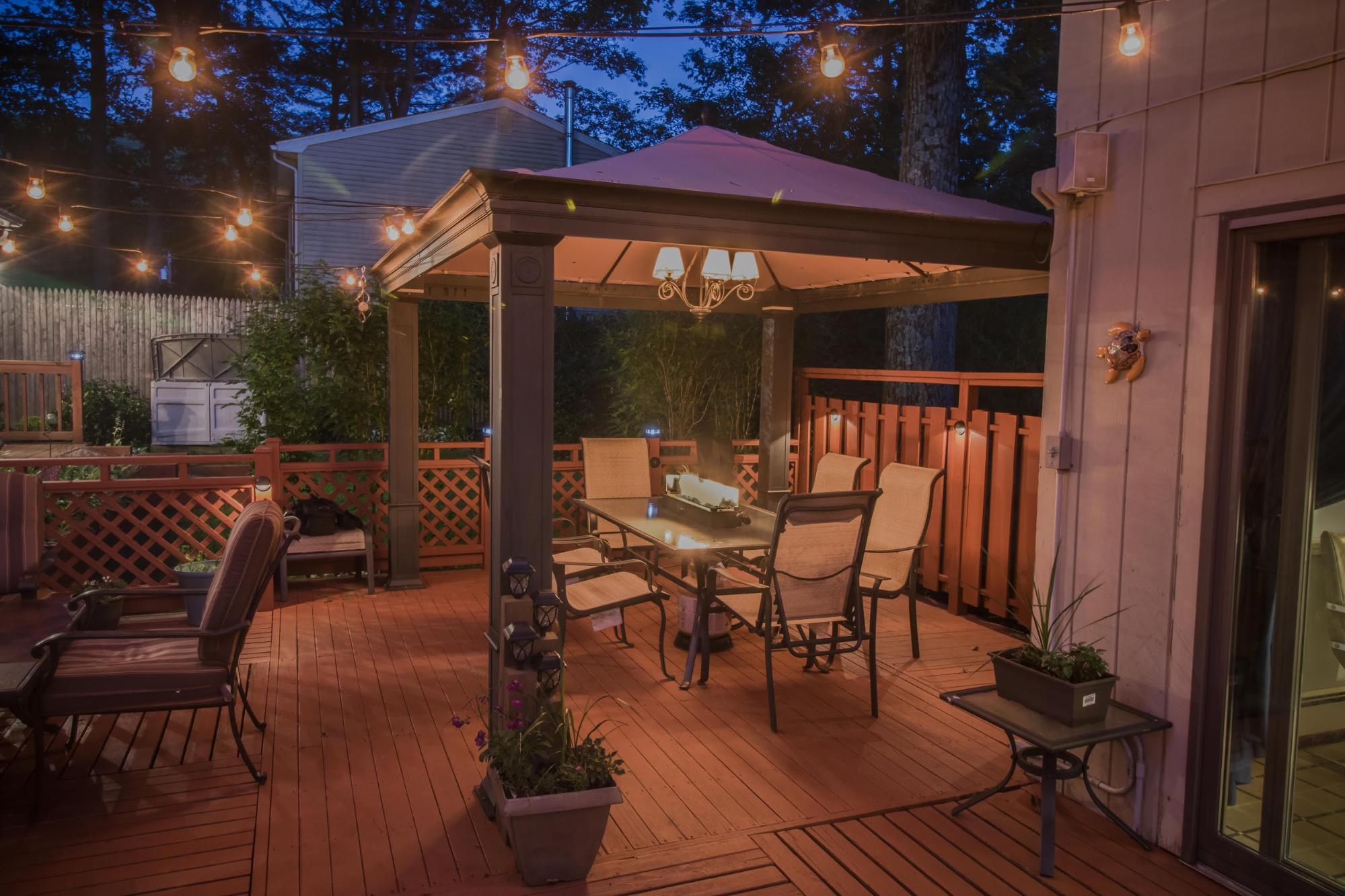 patio with pergola at dusk