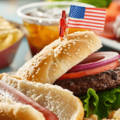 A Fourth of July cookout with hot dogs and hamburgers.