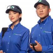 Two JP Pest professionals in uniform